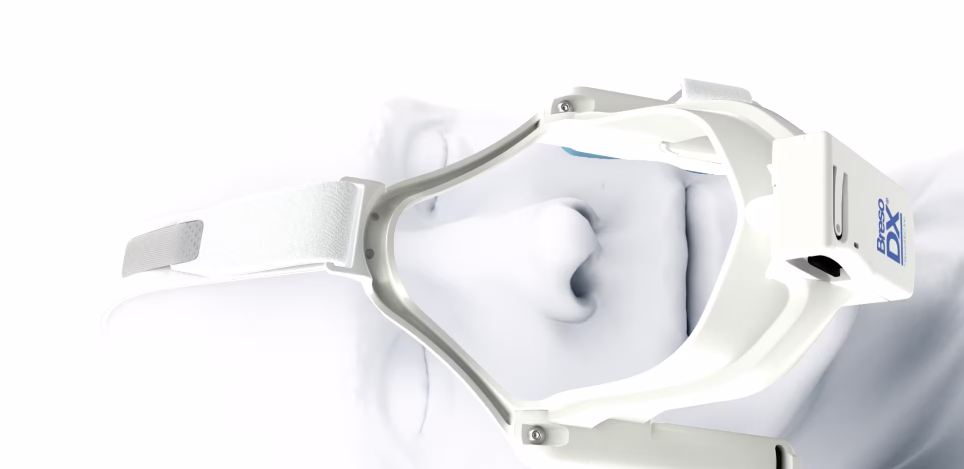 Close-up view of a medical nasal mask device showing the internal frame and adjustable head strap.