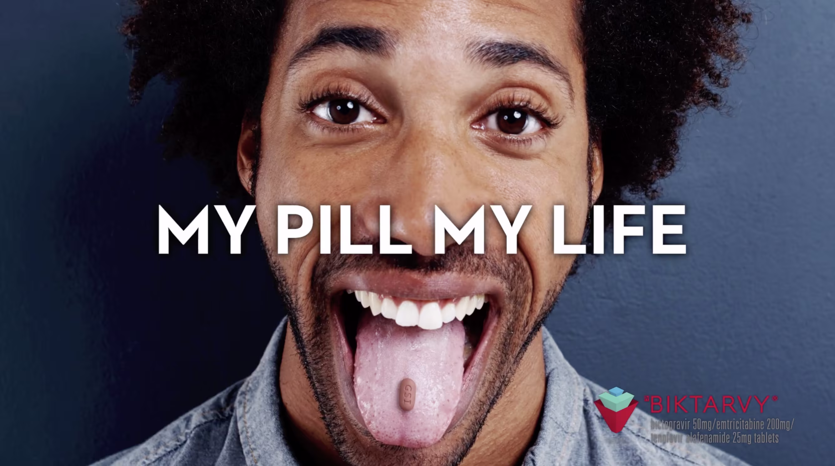 Portrait of a smiling man sticking out his tongue with a pill and text reading “My Pill My Life.